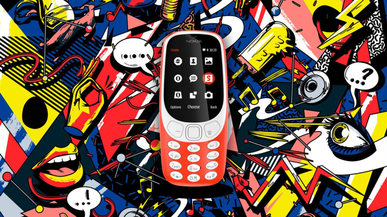 A person plays the classic mobile game Snake as the new Nokia 3310