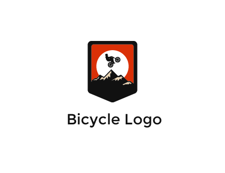 jumping bike and mountain emblem