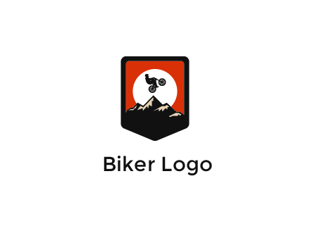 jumping bike and mountain emblem