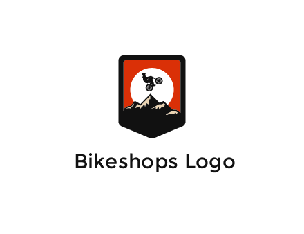 jumping bike and mountain emblem