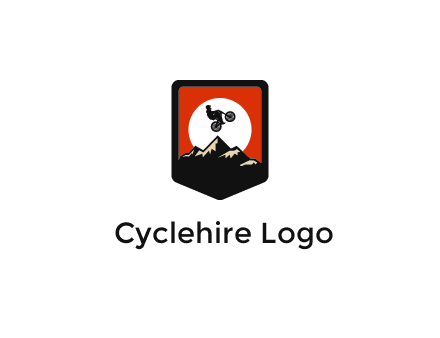 jumping bike and mountain emblem