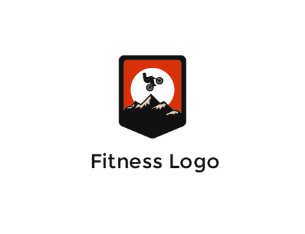 jumping bike and mountain emblem