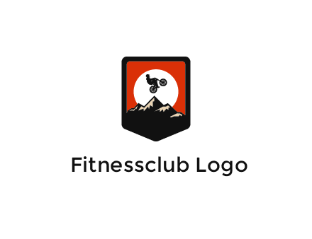 jumping bike and mountain emblem