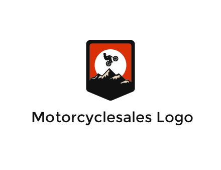 jumping bike and mountain emblem