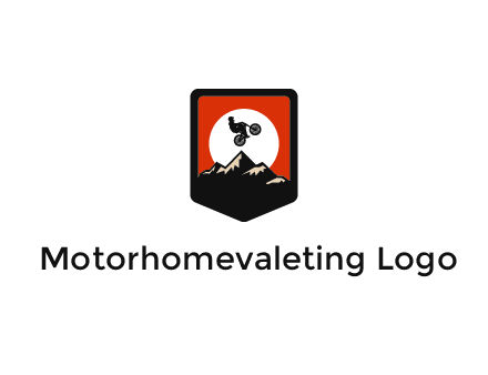 jumping bike and mountain emblem