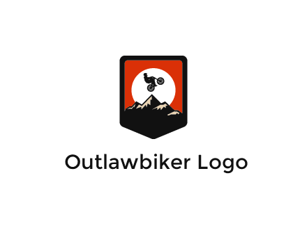 jumping bike and mountain emblem