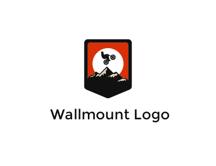 jumping bike and mountain emblem