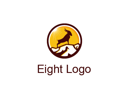 silhouette goat standing on mountain logo