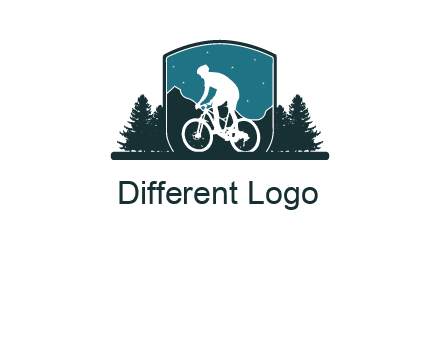 mountain biking in shield with trees emblem logo