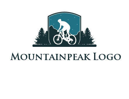 mountain biking in shield with trees emblem logo