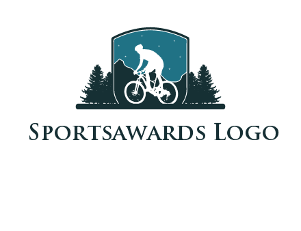 mountain biking in shield with trees emblem logo