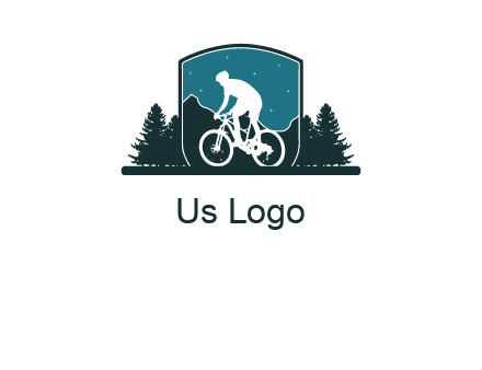 mountain biking in shield with trees emblem logo