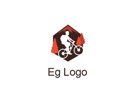 hexagonal mountain biking logo with fir trees
