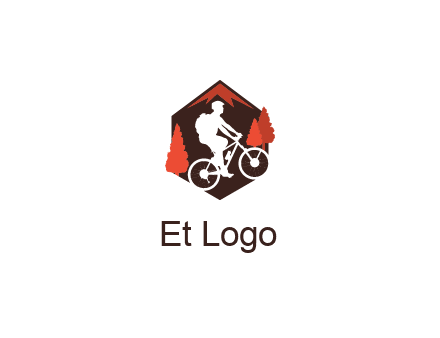 hexagonal mountain biking logo with fir trees
