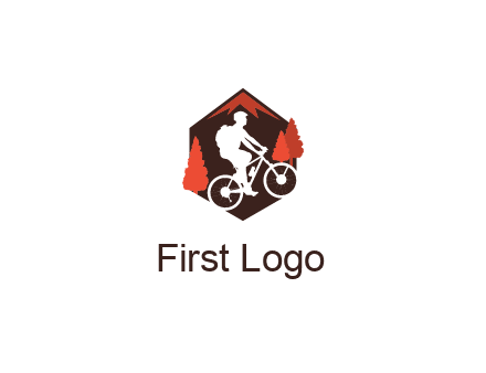 hexagonal mountain biking logo with fir trees