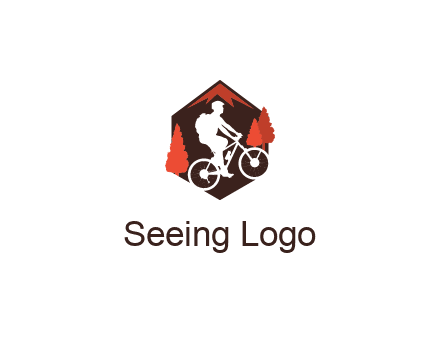 hexagonal mountain biking logo with fir trees