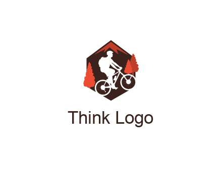 hexagonal mountain biking logo with fir trees