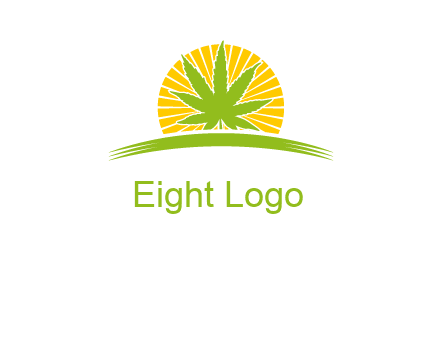 marijuana leaf over the sun setting on the horizon