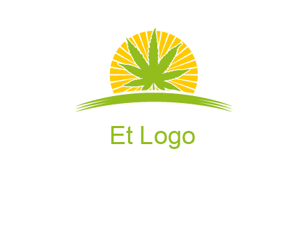 marijuana leaf over the sun setting on the horizon