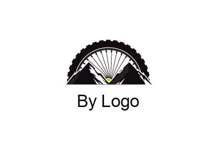 sun's rays forming a wheel behind mountains for a mountain biking logo