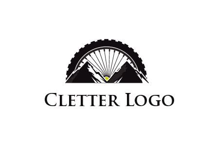 sun's rays forming a wheel behind mountains for a mountain biking logo