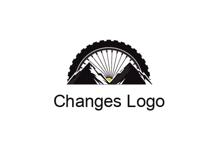 sun's rays forming a wheel behind mountains for a mountain biking logo