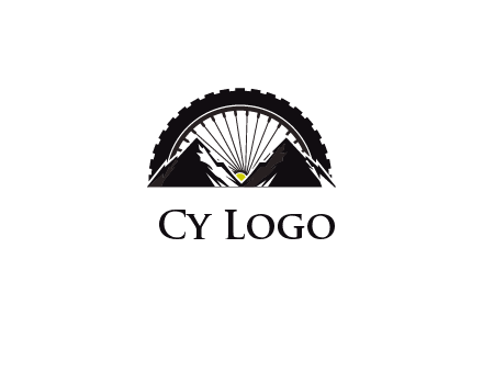 sun's rays forming a wheel behind mountains for a mountain biking logo