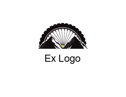 sun's rays forming a wheel behind mountains for a mountain biking logo