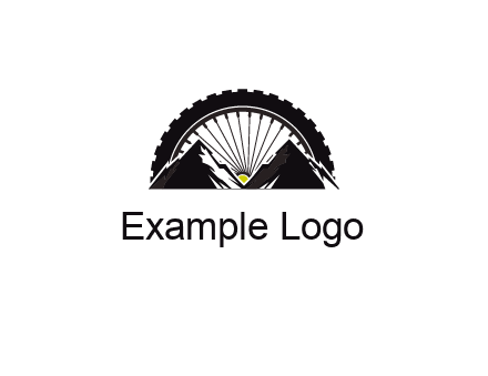 sun's rays forming a wheel behind mountains for a mountain biking logo
