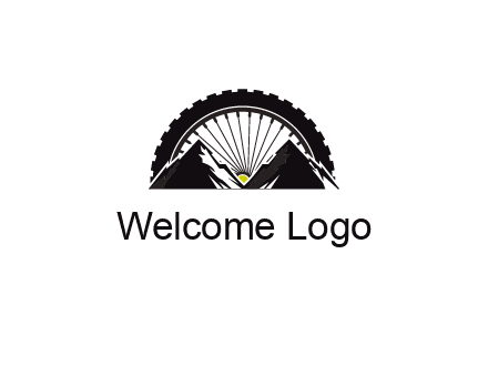 sun's rays forming a wheel behind mountains for a mountain biking logo