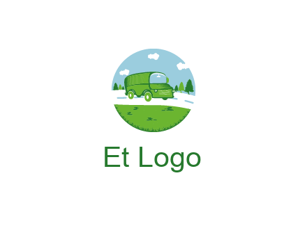 Camper van or bus on a road surrounded by grass, trees and the blue sky