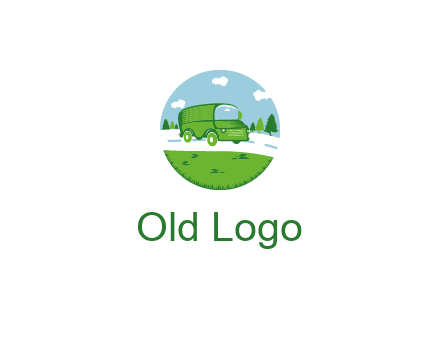 Camper van or bus on a road surrounded by grass, trees and the blue sky
