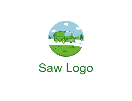Camper van or bus on a road surrounded by grass, trees and the blue sky