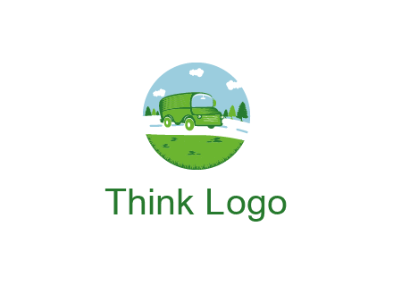 Camper van or bus on a road surrounded by grass, trees and the blue sky