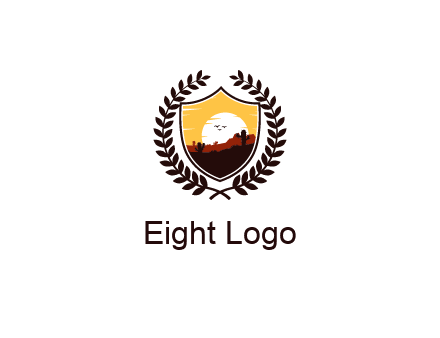 desert and setting sun inside a badge shaped vector surrounded by a wreath