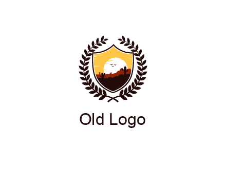 desert and setting sun inside a badge shaped vector surrounded by a wreath
