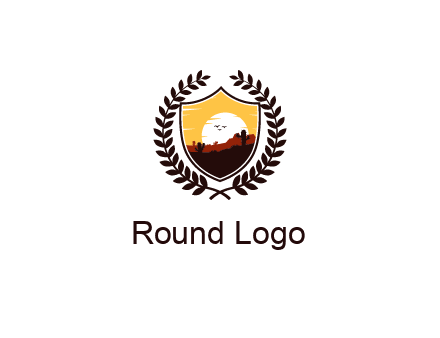 desert and setting sun inside a badge shaped vector surrounded by a wreath