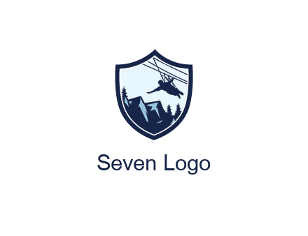 ziplining in mountains in shield logo