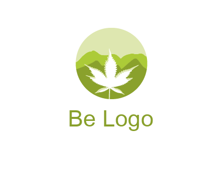 negative spacing marijuana leaf in circle with mountain fields