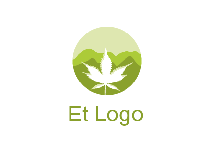 negative spacing marijuana leaf in circle with mountain fields