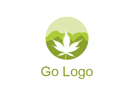 negative spacing marijuana leaf in circle with mountain fields