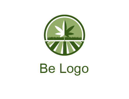 two tone marijuana leaf in circle with grass and field 