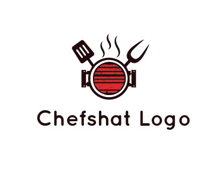 cooking utensils behind grill with steam