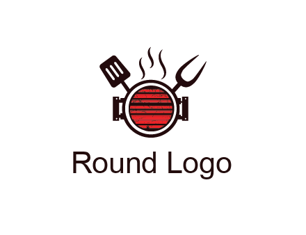 cooking utensils behind grill with steam