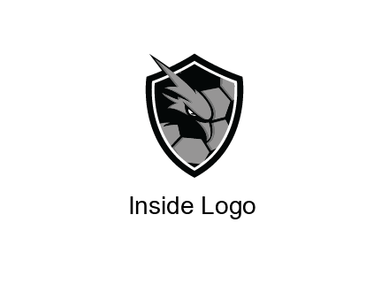 eagle face in shield with football pattern