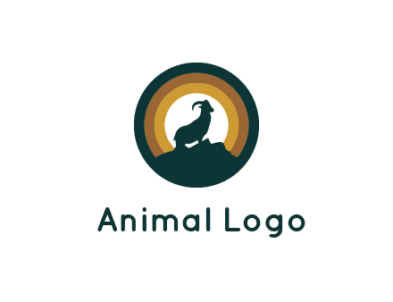 mountain goat silhouette standing on cliff in circle