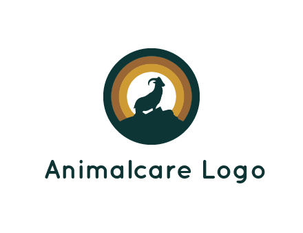 mountain goat silhouette standing on cliff in circle