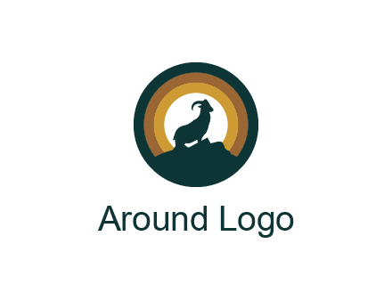 mountain goat silhouette standing on cliff in circle