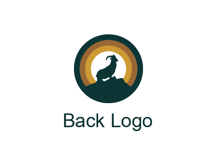 mountain goat silhouette standing on cliff in circle