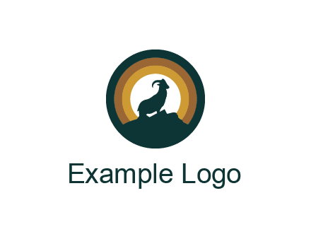 mountain goat silhouette standing on cliff in circle